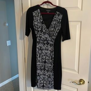 Black dress with blue accents in middle of dress…